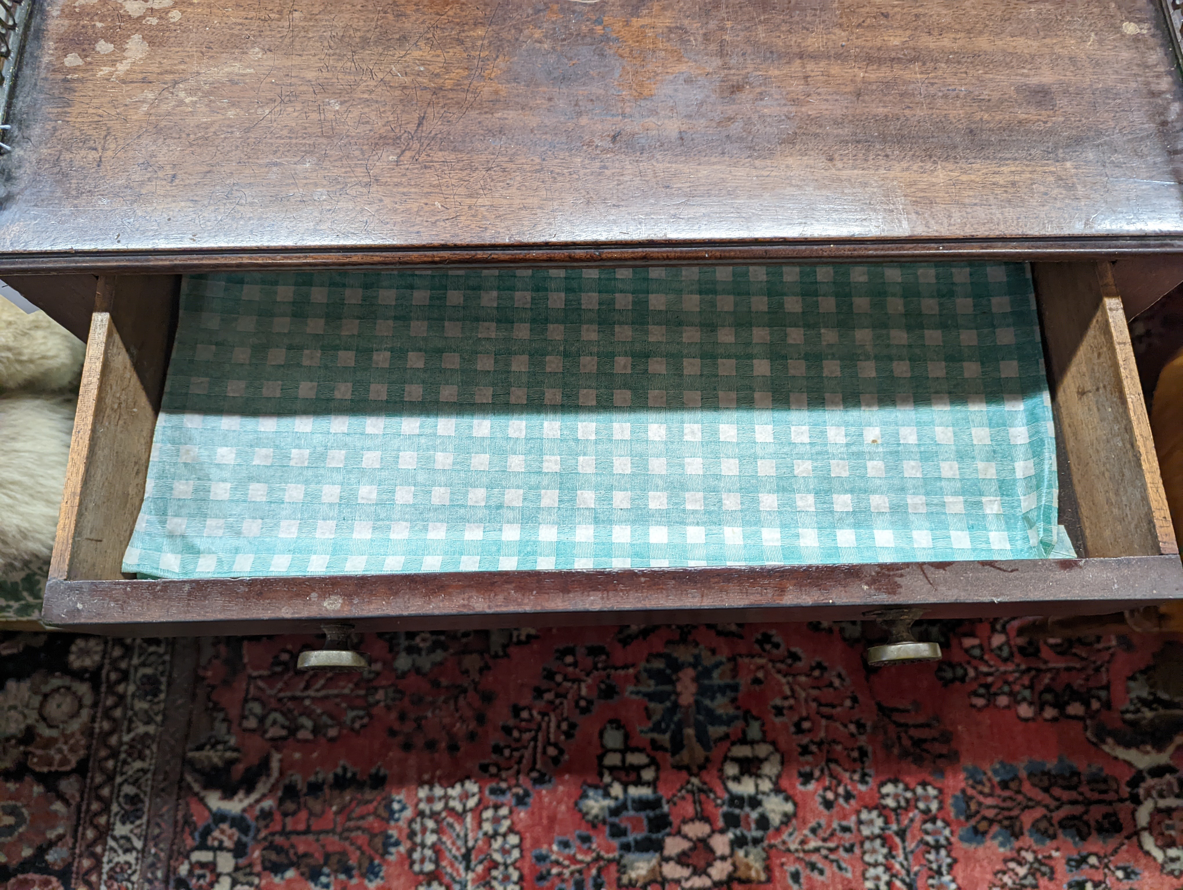 A 19th century mahogany low table (altered), width 35cm, height 51cm